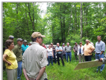 Matt Dallman (TNC) leads a tour at the Caroline Lake Preserve. Photo credit: Jane Severt.
